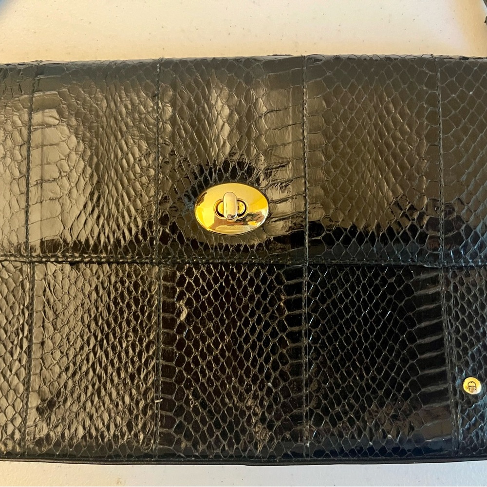 Etienne Aigner black snakeskin pattern clutch purse